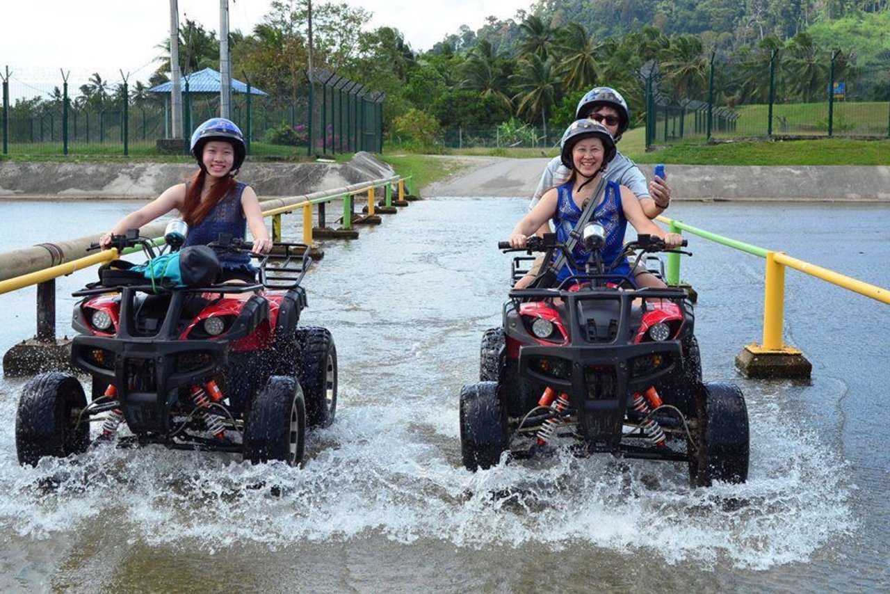 Tourists taking photo on ATV at ATV Adventure Ride Langkawi